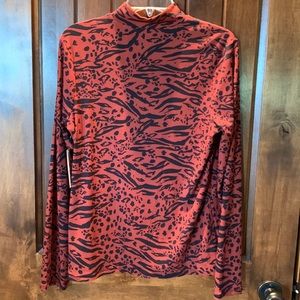 Mock turtle neck, deep rust color with black swirls